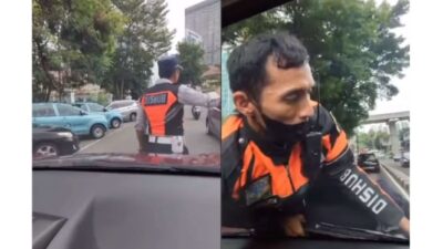 Petugas Dishub DKI Jakarta Terdampar di Atap Mobil, Viral di Media Sosial