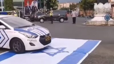 Polisi Mengaku Tidak sengaja Mobil Patroli Melintasi Bendera Israel, Netizen Malah Memberikan Dukungan